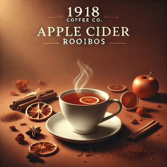 Minimalist image of 1918 Coffee Co.'s Apple Cider Rooibos tea, featuring a warm background with fall-inspired tones of deep reds and oranges. Cinnamon sticks and dried orange peels are scattered around a steaming teacup filled with rooibos tea, evoking warmth and coziness in a clean, text-free design